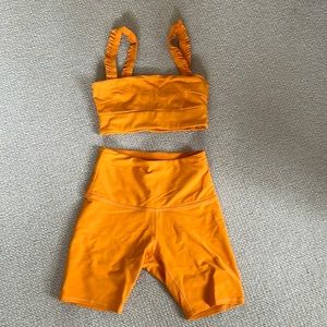 Sincerely Jules for bandier orange workout set